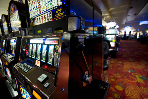 fortunaslot Microgaming game library showing slot titles with demo and real-play buttons